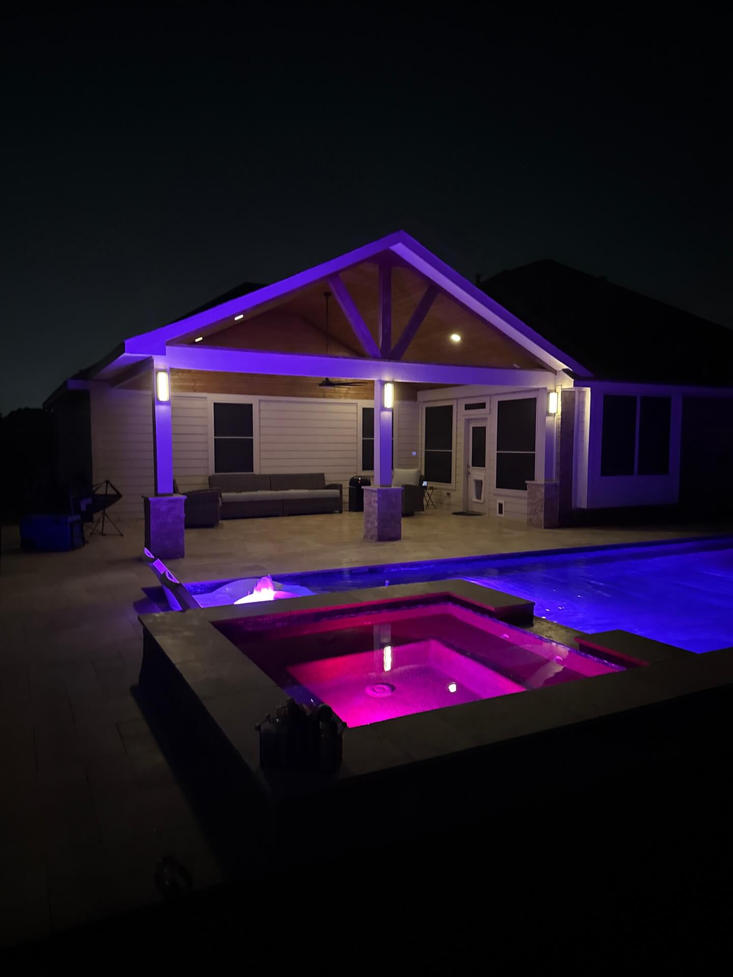 backyard pool at night with minipool
