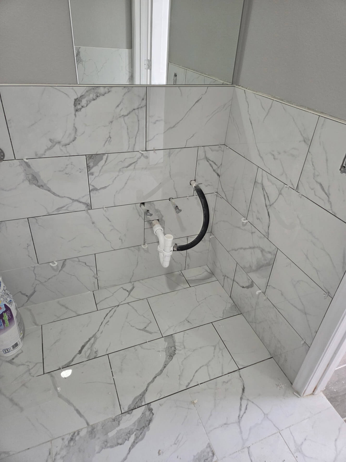 construction work replacing sink